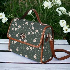 Cottagecore Daisy Boho floral green Canvas Satchel bag, women boho crossed body purse, cute vegan leather strap hand bag, hippies boho gift It's the simple design that makes these Country Life Satchel boho bags the perfect accessory to a boho or Cottagecore / mushroomcore wardrobe. This waterproof canvas with pu leather strap cottagecore crossbody bag is just what you need for a little extra room for your stuff.  Made from quality materials, this cottagecore style boho bag features a secure magn Bohemian Floral Print Tote Shoulder Bag, Bohemian Tote Shoulder Bag With Floral Print, Bohemian Shoulder Bag With Floral Print Tote, Green Floral Print Shoulder Bag, Everyday Green Floral Print Shoulder Bag, Everyday Green Shoulder Bag With Floral Print, Floral Print Satchel Bag As A Gift, Bohemian Bags With Floral Print, Bohemian Green Shoulder Satchel