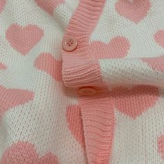 Wear Your Heart on Your Sleeve with Pink Hearts Cardigan! 💖🧥 🌟 Sweet and Stylish: Our heart-patterned cardigan is designed for those who appreciate the charm of sweetness and want to make a style statement that's both adorable and complete. Ideal for individuals who love to blend fashion and comfort effortlessly. ✨ Superior Quality: Crafted with precision to ensure top-notch quality and comfort. This cardigan is designed to keep you looking stylish and comfortable, whether you're out for a ca Sweet Pink Cardigan For Fall, Cute Long Sleeve Cardigan, Sweet Pink Long Sleeve Cardigan, Cute Heart Print Winter Sweater, Cute Winter Sweater With Heart Print, Trendy Heart Print Sweater For Valentine's Day, Trendy Cotton Sweater With Heart Print, Trendy Valentine's Day Sweater With Heart Print, Pink Heart Sweater For Spring