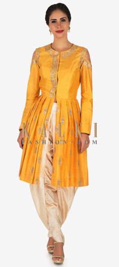 Buy Online from the link below. We ship worldwide (Free Shipping over US$100)  Click Anywhere to Tag Yellow dhoti suit crafted with gotapatti butti embroidery work only on Kalki If you are the one who love experimenting fashion then opt for this yellow dhoti suit. The suit is featured in silk fabric. It is intricately textured beautifully with gota patti patch butti work and showcases the pleated design effortlessly. It flaunts the cold-shoulder pattern with front hook closure. Butti Embroidery, Designer Mehendi, Peplum Pants, Mehendi Dresses, Ladies Suits Indian, Desi Couture, Mehndi Outfit, Bridal Mehndi Dresses, Desi Wedding Dresses