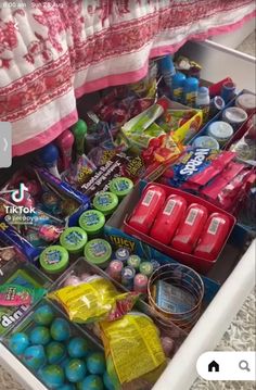 an open drawer filled with candy and candies