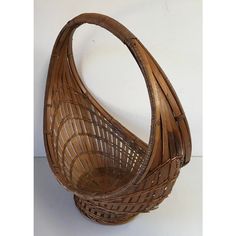 a brown wicker basket sitting on top of a table