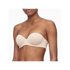 The most comfortable strapless silhouette, this minimalist and sleek Calvin Klein bra features push-up styling in smoothing, lightweight microfiber. Designed with convertible, detachable straps for multiway wear and added versatility, this women's Calvin Klein bra is a wardrobe must-have.Click on this INTIMATES & SLEEPWEAR Guide to find the perfect fit and more! Strapless silhouette Convertible, detachable straps Push-up padded cups with versatile plunge styling High elastane wing liner for a se Elegant Solid Tube Top With Built-in Bra, Strapless Bra With Padded Cups, Elegant Calvin Klein Bra With Built-in Support, Elegant Calvin Klein Underwire Bra, Calvin Klein Elegant Underwire Bra, Fitted Elegant Calvin Klein Bra, Elegant Fitted Calvin Klein Bra, Strapless Push Up Bra, Wing Liner