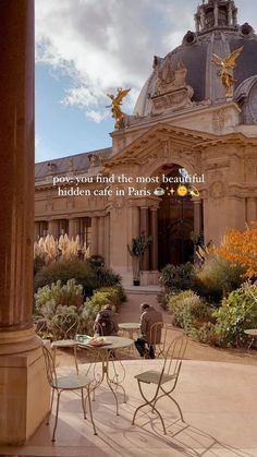 an outdoor cafe with tables and chairs in front of a domed building that says, never find the most beautiful hidden cafe in paris