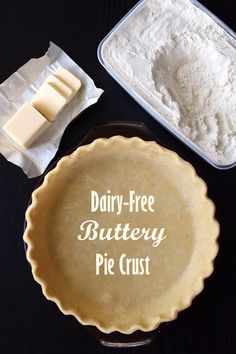 dairy - free buttery pie crust in a pie pan next to two containers of butter