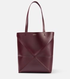 Luxury Burgundy Tote Bag, Designer Calf Leather Shoulder Bag With Leather Backing, Modern Calf Leather Shoulder Bag With Leather Backing, Luxury Leather Bucket Bag For Business, Luxury Leather Business Bucket Bag, Designer Leather Bucket Bag For Business, Designer Burgundy Bags With Leather Lining, Luxury Burgundy Bag In Soft Leather, Luxury Burgundy Bags In Soft Leather