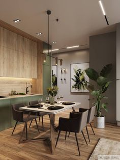 a dining room table with chairs and a potted plant