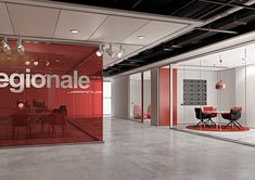 an office with red walls and chairs in front of the glass wall that says regionale