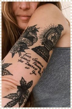 a woman with a tattoo on her arm