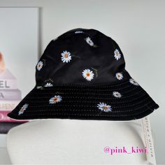 This Alice + Olivia Hat Is Nwt! Black With Daisy Print On One Side, Solid White On The Other. Bucket Style Hat. Brim. Size: Os Brim Width: 2.8” Interior: 100% Polyester Exterior: 96% Polyester, 4% Viscose No Trades Or Modeling Dog Friendly Closet. Daisy Bucket Hat, Olivia Black, Daisy Print, Dog Friendly, Alice Olivia, Hat Fashion, Dog Friends, Bucket Hat, Daisy