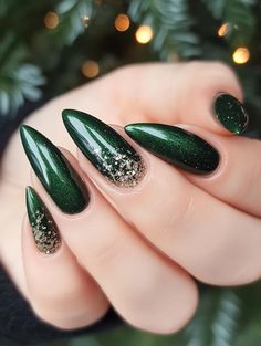 Unwrap a world of beauty with 28 dazzling green Christmas nail ideas! From subtle mint snowflakes to striking evergreen statements, discover manicures that capture the spirit of the season. Let your fingertips sparkle and shine at every winter celebration. Holiday Green Nails Christmas, Christmas Nails Green Almond, Christmas Nails Inspiration Green, Dark Green Nails With Sparkle, Sparkle Nails Green, Forest Green And Silver Nails, Green Sparkly Christmas Nails, Dark Green Nails Christmas, Dark Green And Silver Nails