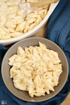 two bowls filled with macaroni and cheese