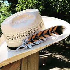 Custom leather hatband with handmade and hand painted leather feather. This exact pair has been sold, but I can make you one substantially similar. Please indicate the size of hat when ordering. Please message me with your particular design or for any additional customization, please contact me before ordering. Artisan Hats With Feathers And Adjustable Fit, Adjustable Feather Hat Bands For Summer, Summer Hat Bands With Feathers For Country Events, Feathered Hat Bands For Country Events In Summer, Feather Hat Bands For Country Events In Summer, Custom Feather Hat Bands For Country Events, Custom Hats With Feathers For Rodeo, Western Summer Hat With Feathers, Western Summer Hats With Feathers