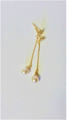 "Adorable Large Teardrop Pearls and Zircon Dangle Earrings in 14K Gold Filled metal In the top of each earring is heart shaped with 3 real faceted clear Zircons. (They are real and are not cubic zirconia) These Pearls have beautiful Luster Natural Ivory Color to these real Freshwater Pearls. The Pearls are hand set in 14K Gold Filled metal. These Large Freshwater Pearls measure 9.50 mm long x 5.50 mm wide. The matching Earring backs are 14K Gold Filled. These Lovely Earrings are large though del Yellow Gold Drop Linear Earrings For Wedding, Yellow Gold Dangle Bridal Earrings, Yellow Gold Pearl Drop Dangle Chandelier Earrings, Teardrop Jewelry With Bail For Wedding, Yellow Gold Teardrop Linear Earrings For Wedding, Wedding Yellow Gold Linear Teardrop Earrings, Gold Briolette Teardrop Earrings For Wedding, Celebration Pearl Drop Dangle Earrings, Briolette Yellow Gold Earrings For Weddings