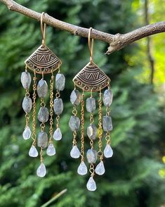 These boho chic earrings are made with gorgeous angled cut flashy labradorite and rainbow moonstone teardrops beautifully designed in a fringe style. The metal components are gold filled and non tarnish gold brass. These earrings measures close to 3 inches in length. Boho Chandelier, Beaded Chandelier Earrings, Boho Chic Earrings, Whimsical Jewelry, Seed Beading, Tourmaline Earrings, Labradorite Earrings, Chic Earrings, Quartz Earrings