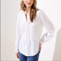 Drapey Blouson Sleeves Treat This Pulled-Together Henley Blouse To A Touch Of Romance. Round Neck. Long Sleeves With Banded Cuffs. Henley Button Front. 100% Cotton. Imported. Retail: $59.50 White Pintuck Long Sleeve Tops, Chic Spring Tops With Pintucks, Chic Pintuck Tops For Spring, White Casual Top With Pleated Sleeves, Chic Tops With Pintucks For Spring, White Casual Tops With Pleated Sleeves, Casual White Tops With Pleated Sleeves, Casual Pintuck Blouse For Work, Relaxed Fit Pintuck Tops For Work