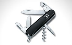 the swiss army knife is open and ready to be used as a keychain