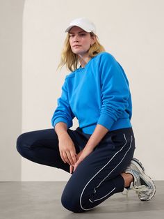 FOR: Commuting, work, and travel FEEL: Plush stretch fleece has a soft, brushed interior Relaxed with room to move Regular length, hits at low hip Crew neck. Work And Travel, Bra Dress, Summer Is Here, Swim Accessories, Crew Sweatshirts, Jacket Tops, Shop Now, Crew Neck, Collar