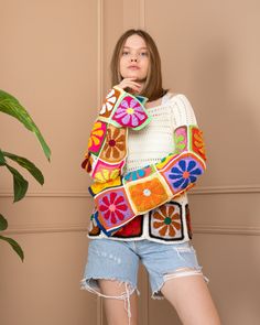 Every stitch I weave into this colorful flowers sweater is an expression of my boundless devotion, affection, and attentiveness. ❤️ This handmade knitted crop top is an amazing for beautiful women. It will perfectly fit with your jeans, shorts. Especially you could combine it with long boho skirts... Also you can wear it in summer on the beach or party. Model size information:  167 cm / 5.47 Feet  / 66 kg  Chest: 95 cm /  37.40 inch Please write your bust measurements and I will prepare your mea Spring Crochet Acrylic Sweater, Bohemian Multicolor Sweater For Spring, Spring Acrylic Crochet Sweater, Spring Bohemian Multicolor Sweater, Multicolor Patchwork Knit Sweater, Retro Multicolor Sweater For Spring, Multicolor Crochet Top For Winter, Multicolor Crochet Top For Fall, Bohemian Acrylic Sweater For Spring