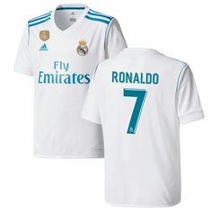 a white jersey with the number 9 on it and blue lettering that reads,'real madrid