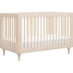 a wooden crib with white sheets on the bottom and side rails, against a white background