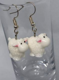 Sheep Earrings Made with hypoallergenic materials, with a silver hook Please note there may be slight variations in colour due to differences in some computer and phone screens.  We have tried our best to present the product as accurately as possible. Novelty White Hypoallergenic Jewelry, Novelty Hypoallergenic White Jewelry, Hypoallergenic Novelty White Jewelry, Hypoallergenic White Novelty Jewelry, Novelty White Earrings For Pierced Ears, Novelty White Earrings As A Gift, Novelty White Earrings For Gifts, Novelty White Dangle Earrings, Novelty White Drop Earrings