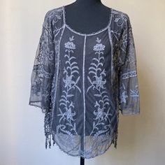 Beautiful Unworn Sheer Tunic Top With Crocheted Side Panels And Floral Embroidery. Loose Fitting Style. It Is 21” Pit To Pit. Bohemian Embroidered Long Sleeve Top With Lace Trim, Bohemian Embroidered Lace Top For Spring, Embroidered Bohemian Lace Top For Summer, Summer Bohemian Blouse With Lace Work, Bohemian Summer Blouse With Lace Work, Spring Bohemian Lace Embroidered Top, Bohemian Lace Blouse With Floral Embroidery, Summer Festival Lace Blouse, Spring Tunic Top With Intricate Embroidery