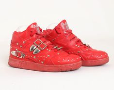 "FEATURES - 1980s sneakers - LA Gear label - 1989 Michael Jackson \"Billie Jean\" signature shoes - Rare red color - High top style - Studded leather uppers - Velcro straps with silver buckles CONDITION Great vintage condition: minor scuffing; minor wear in the rubber soles; one of the metal buckles is dented on the left shoe. MEASUREMENTS & FIT marked size: vintage women's US 8 / UK 6 / EU 39 suggested size: women's US 8-8.5 length of insole: 9.5\" width of outer sole: 3.5\" color: red, silver 1980s Sneakers, Red Leather High-top Sneakers, Michael Jackson Sneakers, Red High-top Sneakers With Cushioned Footbed, La Gear Sneakers, Red High-top Breathable Skate Shoes, Red Breathable High-top Skate Shoes, Michael Jackson Billie Jean, Vintage Shoes Women