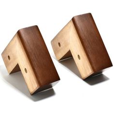 pair of wooden brackets on white background