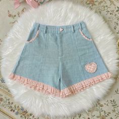 These Sweet Lolita Lace Denim Shorts are perfect for any occasion. Featuring an all-over lace design and classic denim material, they provide a feminine feel while still maintaining a classic, timeless style. The lightweight and breathable fabric is ideal for wearing all year round, making them a great choice for any season. Cute Pink Bottoms With Pockets, Cute High Waist Pants For Spring, Cute Wide Leg Spring Bottoms, Cute Short Summer Jeans, Cute High-waist Denim Blue Jeans, Cute High-waist Cotton Bottoms, Cute High Waist Denim Blue Jeans, Cute High Waist Summer Jeans, Cute High Waist Cotton Bottoms