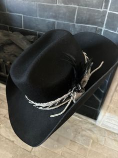 Women's cowboy hat  Boots not included  Decorative wool cowboy hat.  Geo quarts charm attached One size fits most  56-58  Adorable   All sales final. Birthday girl, bride to be, bachelorette fun.  Need a different color ? Message me. Wool black hat. silvers, black white, gray, black feather Western Black Hat Bands For Country Events, Western Black Hat For Country Events, Western Style Black Hat Bands For Country Events, Black Country Style Top Hat For Country Events, Western Style Black Top Hat For Fall, Southwestern Black Hat Bands For Country Events, Black Felt Hat For Country Events, Black Country Style Felt Hat For Country Events, Black Western Top Hat For Rodeo