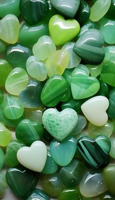 many green and white heart shaped rocks together