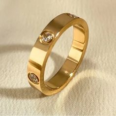 Gold Nail Head & Rhinestone Rings Unisex New With Tags Color Gold Metal Stainless Steel Width 4 Mm See Image For Ring Size Measurements خواتم خطوبة, Friendship Rings, Rhinestone Ring, Zircon Ring, Couple Rings, Cartier Ring, Engagement Jewelry, Love Ring, New Classic