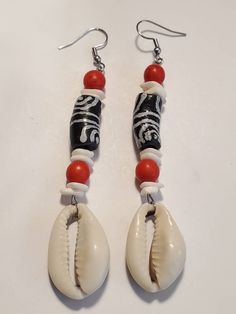 Black White Ghana Krobo Cowrie Shell Dangle Earrings https://etsy.me/35k1qNV Bohemian White Earrings With Black Beads, White Dangle Jewelry With Black Beads, Black Beach Jewelry With Dangling Beads, Beach Jewelry With Black Dangling Beads, Black Dangling Beads Jewelry For Beach, White Drop Earrings With Black Beads, White Bohemian Beaded Earrings With Black Beads, Black Beaded Drop Earrings With Large Beads, Black Large Beaded Drop Earrings