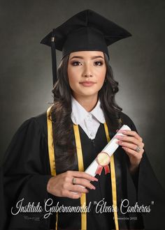 a woman in graduation cap and gown holding a diploma