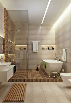 a bathroom with two sinks, a bathtub and a stand up shower in it