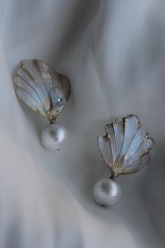 - The stunning floral adornment earrings features handcrafted dip art UV resin seashell elements  - The dangle drop earrings feature light and textured cotton pearls;  - Looks so realistic and absolutely fantastic live; -  A very light and sturdy construction;  - SIZE:  - Available in silver and gold hardware; - Rhodium-plated hypoallergenic posts; With love, Anastasia Enze Bridal Jewelry Seashell Pearl Earrings, Dip Art, Earrings For Bride, Ocean Inspired Jewelry, Earrings Beach, Wedding Jewelry Earrings, Beach Theme, Feature Light, Ocean Inspiration