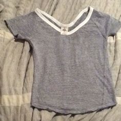 Such A Cute Soft T-Shirt I’m Just Selling It Because I’ve Never Worn It So I Figured It’s Time To Get Rid Of It Casual White Scoop Neck Top, Summer White Tri-blend Tops, Sporty Scoop Neck Top With Graphic Print, White Tri-blend Summer Tops, Sporty Scoop Neck Cotton Tops, Sporty Cotton Tops With Scoop Neck, Casual Gray Scoop Neck Top, Sporty Cotton Scoop Neck Top, Sporty Tri-blend Short Sleeve Tops