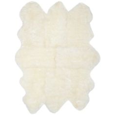 a white sheepskin rug on a white background