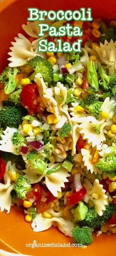 broccoli pasta salad in an orange bowl