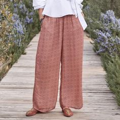 Sundance Alhambra Wide Leg Bohemian Printed Trouser Pants Palazzo Size Medium New Without Tags Color: Dusty Pink & Grey (Colors May Vary Slightly Due To Lighting And The Device You Are Using) The Model Photos Are Truest To Color Pull-On Style 2 Front Pockets Wide Elasticized Smocked Waist Flowy And Lightweight Crinkle Chiffon Style Lined Wide Leg 100% Viscose, Feels Just Like Silk **New To Poshmark? Sign Up Using The Code Marblespikes And Save $10 On Your First Purchase!** *Comes From A Smoke-Fr Sari Pants, Chiffon Pants, Velvet Tees, Pointelle Sweater, Sundance Catalog, Chiffon Fashion, Bohemian Print, Printed Trousers, Long Style