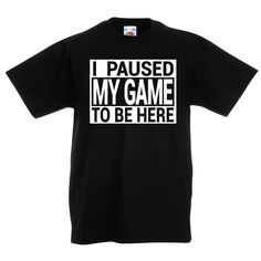 "Step into game mode with our extraordinary Gaming T Shirt. This head-turning gamer tee has been specifically crafted for those passionate young gamers who know that real I Paused My Game To Be Here! 🎮💥  This isn't just your average shirt; it's a statement, a lifestyle. Designed with vibrant graphics, it's the perfect top for any screen warrior. An absolute must-have for every kid's gaming top collection  Crafted with exceptional quality, the shirt is made from soft, smooth and exceptionally durable DTF ink. This ensures that your tee not only feels amazing on the skin but also offers superior longevity, maintaining the perfect balance between comfort and durability. Stand out in the crowd with our unique and trendy gaming Tshirt.🛡️🔝  Beyond just looking good, this shirt is also breath Gaming Event Crew Neck T-shirt With Letter Print, Black Gamer T-shirt With Letter Print, Crew Neck T-shirt With Graphic Print For Gaming Events, Black Graphic Print Tops For Gaming Events, Black Gamer Top With Funny Text, Graphic Print Short Sleeve Tops For Gaming Events, Gamer Style Short Sleeve Tops With Funny Text, Gamer Style Crew Neck Top With Logo Print, Gamer Logo Print Crew Neck Top