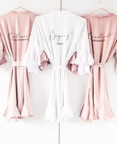 "Bridesmaid robes, Bridesmaid gift, bridal robe, Satin wedding robe, personalised, bridal gown, nightgown, wedding robe, These beautiful ruffle satin robes are a perfect addition to your wedding day. They are so unique and classy, we guarantee they will wow all your bridesmaids.  For other style robes please see my listing https://etsy.me/2WlsQNJ ♥HOW TO ORDER♥  Select colour of the robe and wording. In the \"NOTE TO SELLER\" box please enter the role/name you wish the robe to be personalised wi White Bridal Robe, Satin Bridal Robe, Satin Pyjamas, Satin Robes, Wedding Robes, Gown Gold, Bridal Robe, Wedding Robe, Bridesmaids And Groomsmen