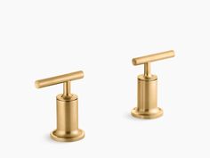 two gold faucets on white background with the words new above them and below it