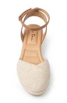 A slim ankle strap refines the look of an espadrille wedge fashioned with memory foam cushioning for everyday comfort. 1 1/2" heel Adjustable hook-and-loop strap Memory foam cushioning Textile upper/synthetic lining/rubber sole Imported Women's Shoes Tan Espadrilles Outfit, Eyes Facts, Tan Bridesmaids, Bridesmaid Shoes Flat, Cruise Clothes, Korea Trip, Chic Dressing, Tie Up Sandals, Lace Up Espadrilles