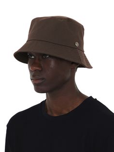 Editor's notesIt is an oversized version of the original bucket hat of the brand. The oversized silhouette fits regardless of the size. The hat has a hand-stitched metal logo patch on the side. The basic colorway goes with any outfit style or mood.- Oversized fit- Simple design- Logo symbol- Comfy fabricMeasurements(in.)One Size- Brim Length: 2.4 in.- Height: 3.9 in.- Circumference: 23.6-24.4 in.*Model info: Model 1 - Height 5’ 10” Fitting size: One Size / Model 2 - Height 6’ 2” Fitting size: On Brown Cotton Bucket Hat With Short Brim, Wide Brim Bucket Hat For Everyday, Curved Brim Bucket Hat For Streetwear, Solid Color Short Brim Bucket Hat For Streetwear, Wide Brim Bucket Hat For Streetwear, Casual Bucket Hat With Logo Patch And Short Brim, Everyday Reversible Curved Brim Bucket Hat, Casual Bucket Hat With Logo Patch And Curved Brim, Solid Curved Brim Bucket Hat For Streetwear