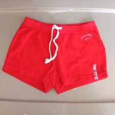 Elastic Waist Red Cotton Sporty Bottoms, Sporty Red Shorts For Loungewear, Red Stretch Cotton Shorts, Red Cotton Shorts For Playwear, Red Cotton Playwear Shorts, Sporty Red Cotton Shorts, Sporty Red Shorts For Playwear, Casual Tommy Hilfiger Bottoms For Loungewear, Red Cotton Shorts For Loungewear