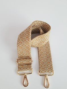 "Boho style, purse or bag strap. This guitar style adjustable strap makes a stylish addition to a boring purse. Easy to clip on any purse or bag. This can also be used crossbody. This is made out of 2 inch wide woven webbing that is beige and deep golden mustard colors. Attached is a antiqued brass, antiqued bronze, silver or gunmetal  lobster clasp. This strap can be adjusted from 31\"-55\", including the hardware. These make wonderful, unique gifts. Contact me for custom lengths. Take a peak a Detachable Crossbody Bag Strap For Everyday Use, Long Strap Crossbody Bag Strap As Fashion Accessory, Beige Rectangular Shoulder Strap For Everyday Use, Trendy Beige Rectangular Bag Strap, Detachable Square Bag Strap For Everyday Use, Trendy Gold Bag Strap For Travel, Everyday Adjustable Crossbody Bag Strap, Adjustable Strap Shoulder Bag For Everyday, Gold Adjustable Shoulder Bag For Everyday Use