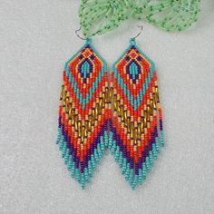 Fringe earrings ,  Long beaded  earrings ,  tribal , Ethnic , boho style , Native American Beaded Ea Long Beaded Earrings, Beaded Stuff, Earrings Patterns, Beaded Earrings Tutorials, Native American Earrings, Native American Beaded Earrings, Beaded Earring, Brick Stitch Earrings, Brick Stitch Pattern