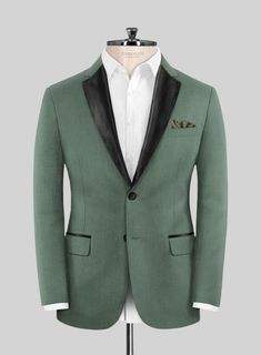 If you treat yourself to some new tailoring, you can't go wrong with our Sage Green Tuxedo Jacket, which offers a trendy statement-making ensemble that is both timeless and adaptable. Our super 120's wool jacket is made with a blend of wool and poly, whereas a solid pattern and green hue instantly give the outfit an eye-catching twist. An excellent option for a fantastic night out or attending a wedding.   Featuring satin lapel, matching satin covered buttons, and gentle texture at its surface, our tuxedo is a subtle fashion-forward take on a traditional tailoring.  Look Includes  Sage Green Fabric  Two Button Tuxedo Jacket Style  Notch Lapel  Black Tuxedo Buttons  Single Vent  Three Cuff Buttons   Click 'Customize Now' to modify the look if needed.   Jacket is fully lined.  Lining: Viscos Sage Green Tuxedo, Subtle Fashion, Grey Check Suit, Sage Green Fabric, White Wedding Suit, Herringbone Tweed Jacket, White Linen Suit, Green Tuxedo, Herringbone Jacket