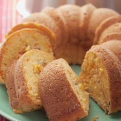 a bundt cake is cut into slices on a plate